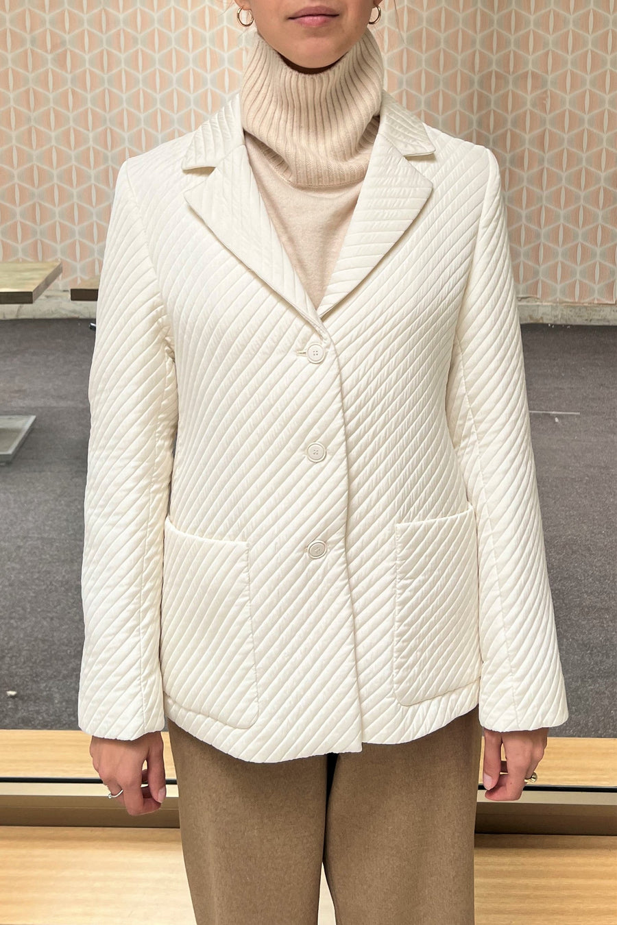 Off white quilted wool suiting jacket