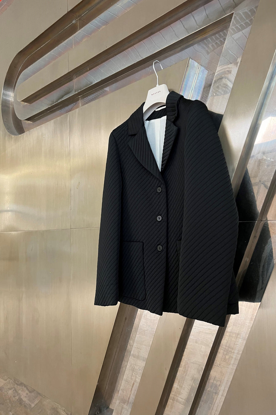 Black quilted wool suiting jacket