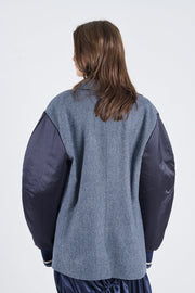 Blue herringbone wool jacket with bomber sleeves