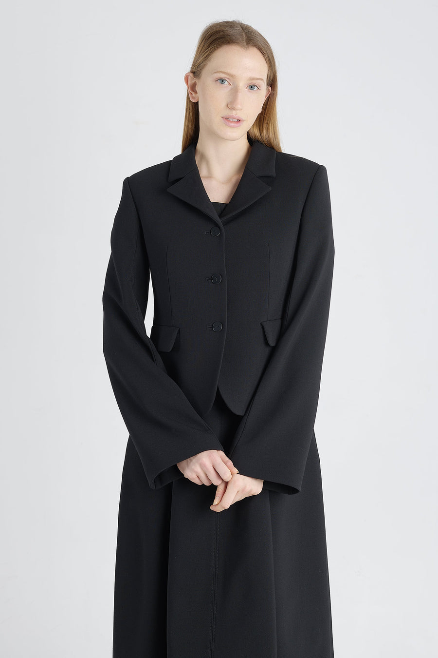 Black wool jacket with bell shaped sleeves