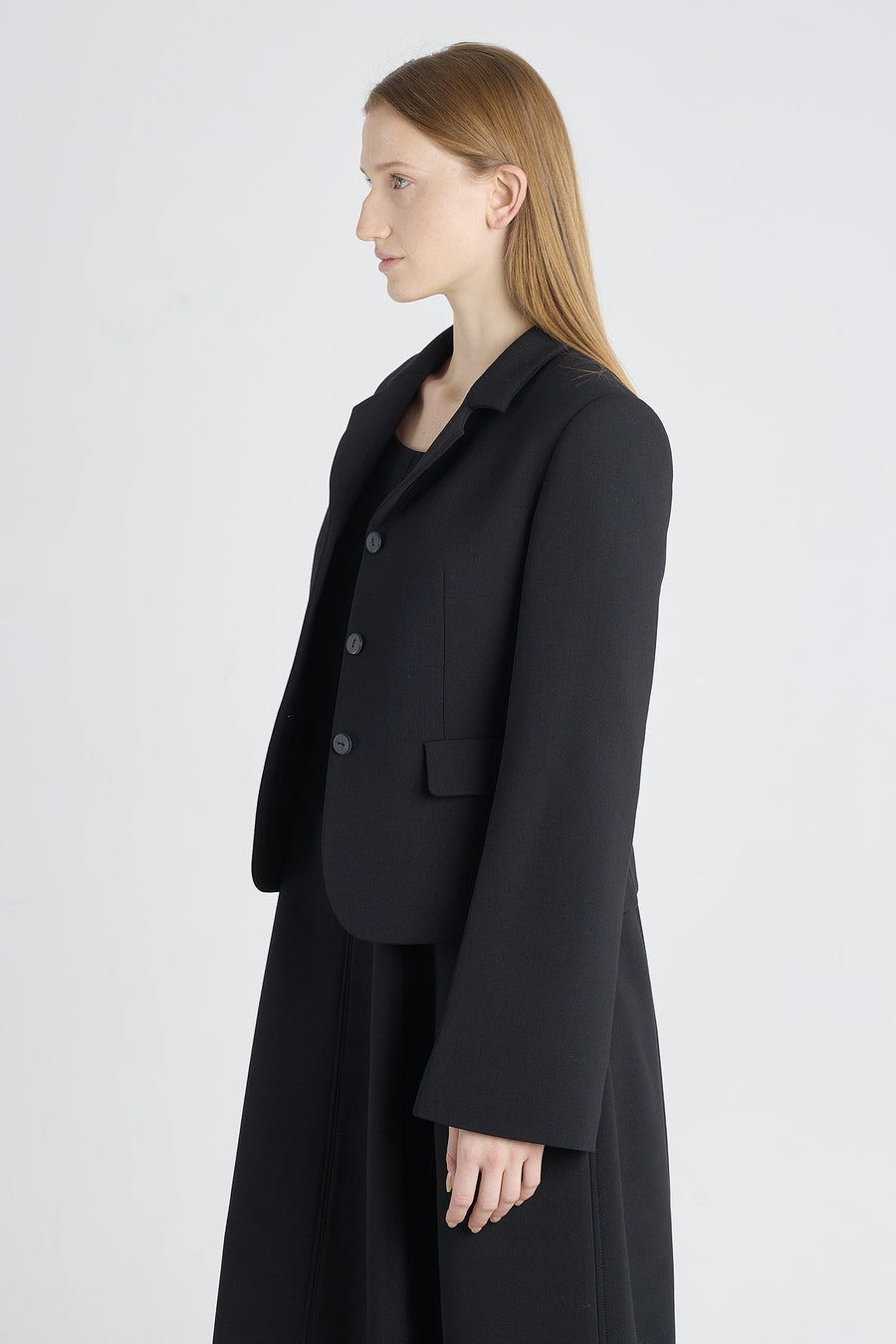 Black wool jacket with bell shaped sleeves