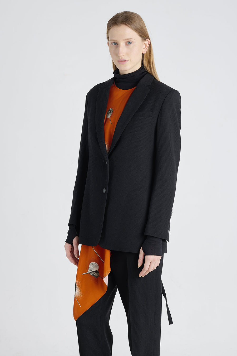Black stretch wool jacket with strap belt
