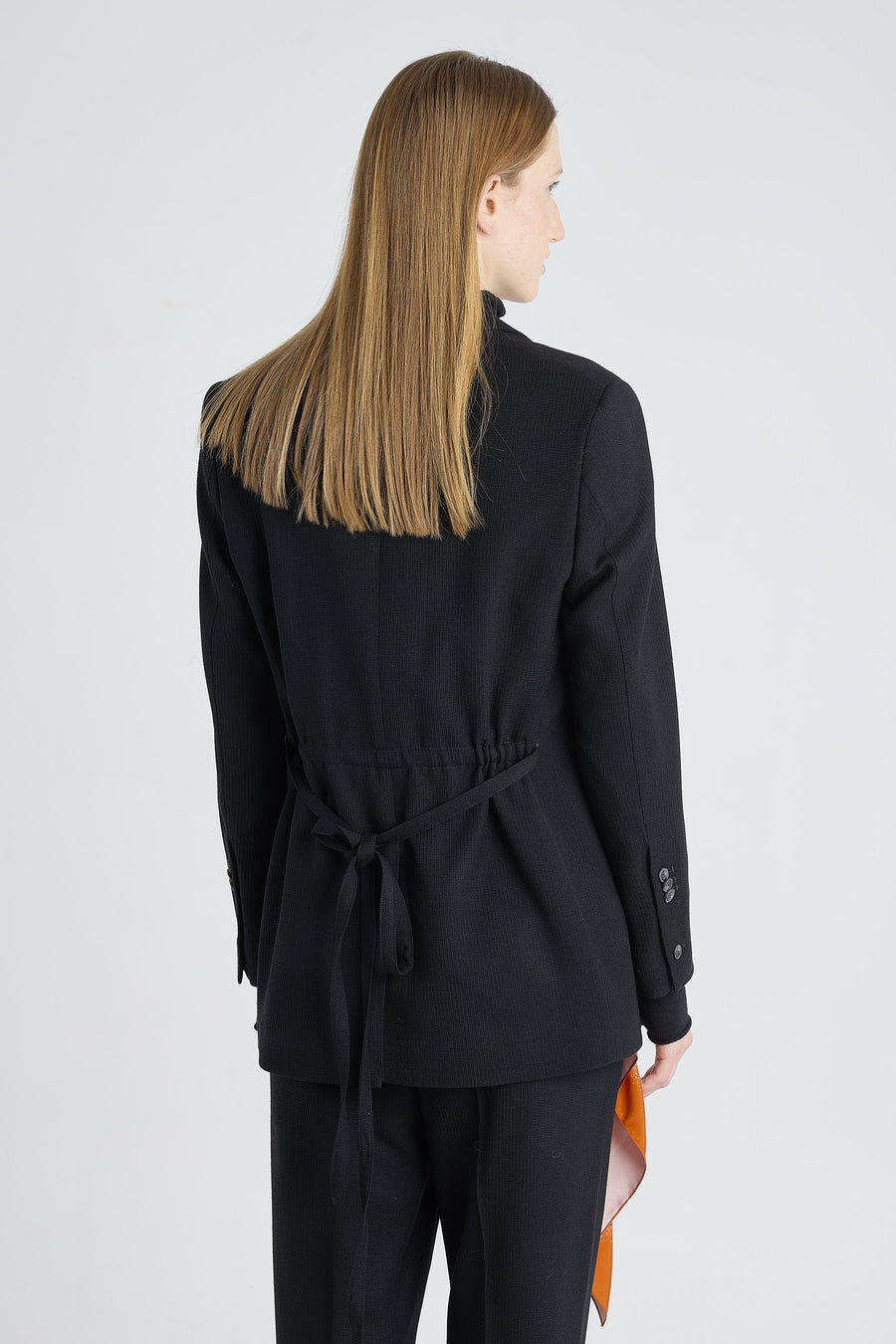 Black stretch wool jacket with strap belt