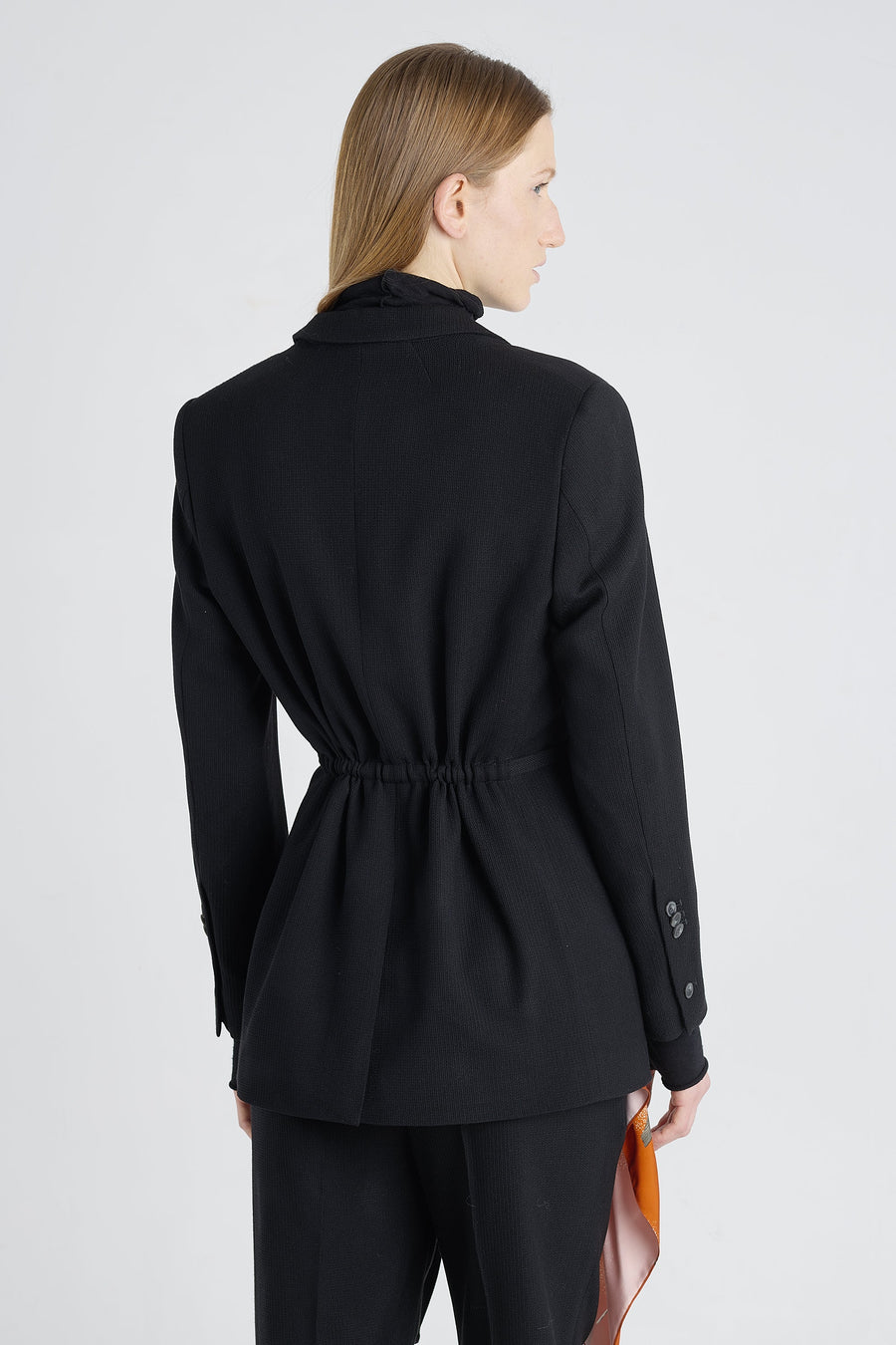 Black stretch wool jacket with strap belt
