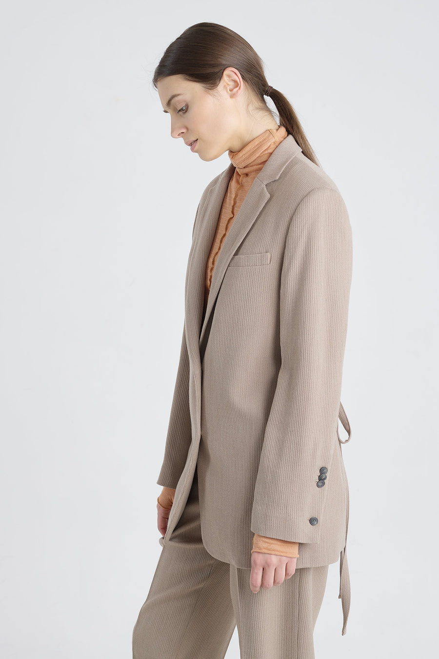 Taupe stretch wool jacket with strap belt