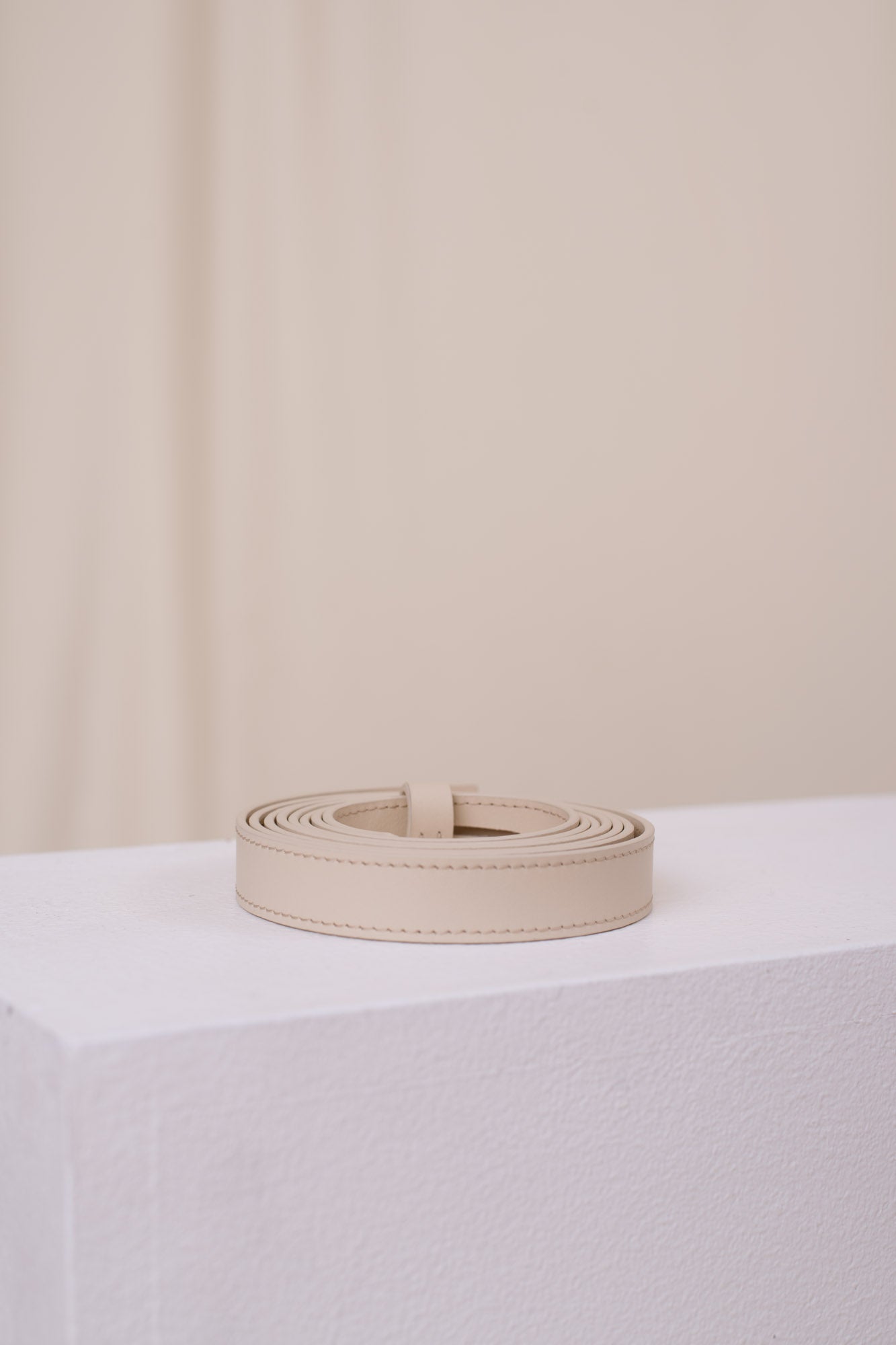 Light ivory long tied belt