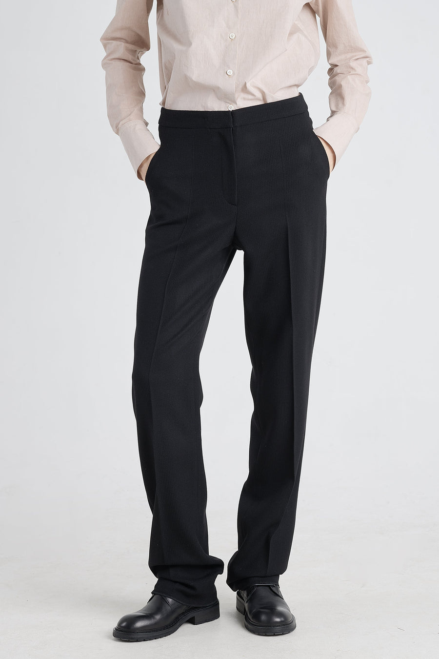 Black stretch wool pants with detachable pockets