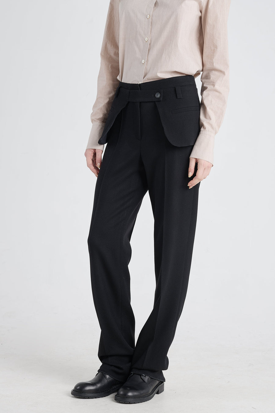 Black stretch wool pants with detachable pockets