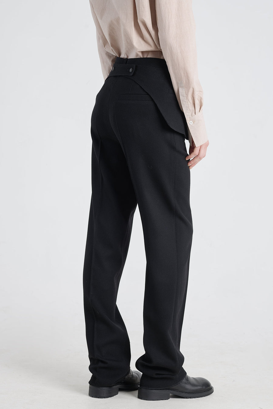 Black stretch wool pants with detachable pockets