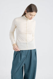 Off white cotton fitted turtleneck