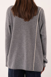 Grey cashmere turtleneck with pearl detail